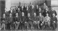 Members of the First Dail Eireann, 21January 1919. Seated from left'.J. O'Doherty, S. Hayes,J.J. O'Kelly, Count Plunkett, C. Brugha, S.T. O'Kelly, P.O'Malley, JJ. Walsh, T. O'Kelly, Standing from left: S. MacSwiney, K.O'Higgins, R. Barton, D. Buckley, R. Mulcahy, E. Duggan, C. Collins, P. Beazley, P. Shanahan, Dr. J. Ryan, Dr Crowley, P. Ward, i.A. Burke, P.J. Maloney, R. Sweetman.