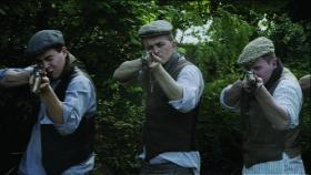Dramatic reconstruction of the IRA firing squad at Coolacrease. The medical records do not support the programme’s contention that there was sexual mutilation involved—i.e. that the Pearsons were deliberately shot in the genitals and the buttocks—but suggest rather that this was a botched execution carried out by inexperienced volunteers. (RTÉ Stills Library)