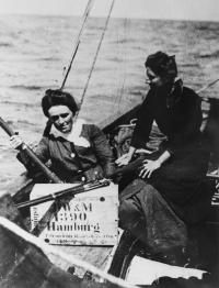 Mrs Childers and Mary Spring Rice aboard the Asgard with Mauser rifles and ammunition boxes (marked ‘Hamburg’) about to be landed in July 1914. Over the last three years the yacht has been undergoing conservation at the National Museum of Ireland, Collins Barracks, and will be going on permanent exhibition in 2011. (National Museum of Ireland)