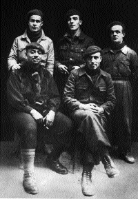 Soldiers of the International Brigade-[left to right, standing] Peter O'Connor (Waterford), P. McEvoy (Dublin), Johnnie Power (Waterford), [seated] W. Garland (USA), John Hunt (Waterford), 2 February 1937, four days before the Nationalist offensive at Jarama.