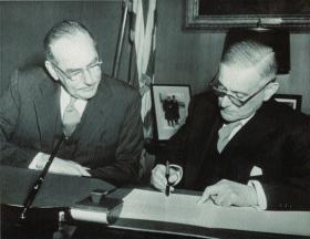 Hearne later became ambassador to Washington. He is seen here (right) signing the Double Taxation Agreement in December 1951 under the watchful eye of US Secretary of State Dean Acheson. (Irish News Agency)