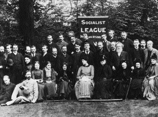 The Hammersmith branch of the Socialist League (founded by Morris in December 1884)-Morris is fourth from the right, middle row. (Victoria and Albert Museum, London)