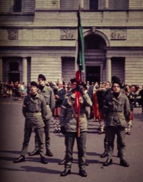 IRA colour party outside Christ the King Cathedral, Mullingar, in July 1969 for the reinterment of Peter Barnes and James McCormack, two IRA men executed in 1940 for their role in the bombing of Coventry the previous year. An estimated 10,000 attended, and the Department of Justice was critical of the fact that ‘the parade in commando style uniform and the firing of shots at the graveside’ took place unhindered and that it was described as an IRA operation in press and TV coverage. (Seamus Murphy)