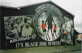 Mural denouncing the 2001 loyalist blockade of Holy Cross girls’ primary school, Ardoyne. Early in 1966 the UVF firebombed the same school. Captain O’Neill was due to address a conference there on how to promote better relations between Protestants and Catholics. (Irlanda Notizie)