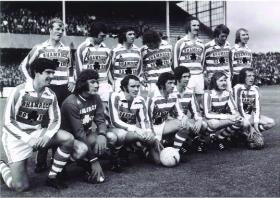 The Shamrock Rovers All-Ireland XI—(back, left to right) Miah Dennehy (RoI & Nottingham Forest), Tommy Craig (NI & Newcastle United), Paddy Mulligan (RoI & Crystal Palace), Martin O’Neill (NI & Nottingham Forest), Derek Dougan (NI & Wolverhampton Wanderers), Alan Hunter (NI & Ipswich Town) and Liam O’Kane (NI & Nottingham Forest); (front, left to right) Bryan Hamilton (NI & Ipswich Town), Pat Jennings (NI & Tottenham Hotspurs), Tommy Carroll (NI & Birmingham City), John Giles (RoI & Leeds United), Don Givens (RoI & Queen’s Park Rangers), Terry Conroy (RoI & Stoke City) and Mick Martin (RoI & Manchester United). (SPORTSFILE) 