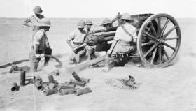 A Royal Field Artillery 18-pounder field gun, of the type used by Tom Barry’s unit, in action in Mesopotamia (Iraq) in March 1917. (Imperial War Museum)