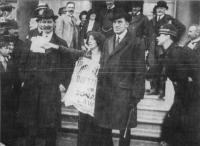 Meg Connery of the Irish Women's FranchiseLeague attempts to hand suffragist literature to Bonar Law (left) and Edward Carson (right). (COURTESTY OF THE NATIONAL LIBRARY OF IRELAND)