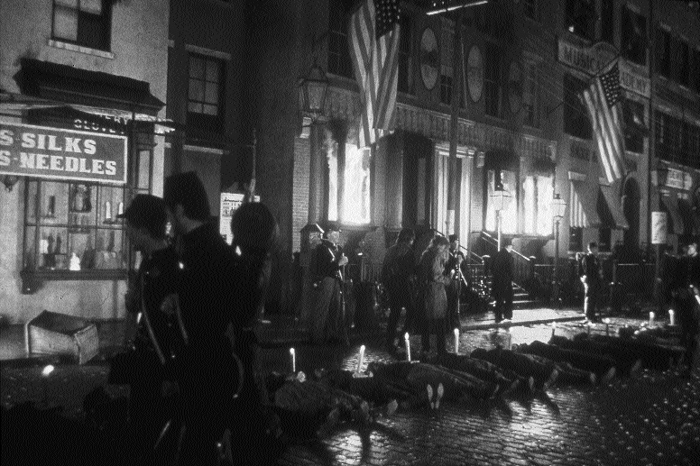 The burning Ninth Congressional District draft office, where the riots started on the morning of Monday 13 July, as depicted in Martin Scorsese's ‘Gangs of New York'. (Warner Brothers)