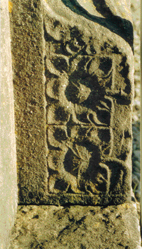 Detail from the west doorway at Rosserk. The proximity of Rosserk to Moyne friary has led to suggestions that Moyne was established owing to the refusal of the friars at Rosserk to adopt the observant reform. Moyne is devoid of decorative carvings such as this.