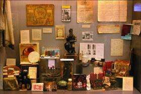 The Bloomsday display—the items may be crammed into the cabinets but they are all put there for a reason and relate to a particular theme. (Irish Jewish Museum and Heritage Centre)