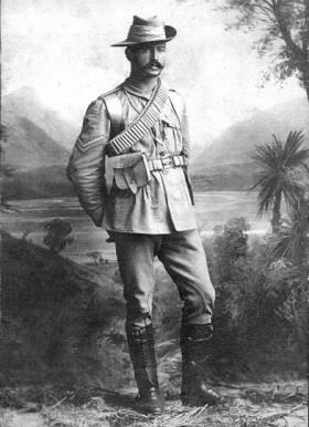 In his Boer War uniform.