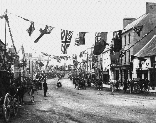 Main Street, Naas, decorated for the visit of King Edward VII to Punchestown in 1904.