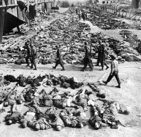 Death camp, Nordhausen, 1945—American troops organise the bodies of 3,000 slave labourers for burial. (John Florea/Life/Timepix) 