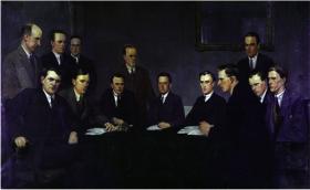 Michael Collins (intelligence), Richard Mulcahy (chief-of-staff), Gearóid O’Sullivan (adjutant-general), Eamon Price (organisation), Rory O’Connor (engineering & OC Britain), Eóin O’Duffy (assistant chief-of-staff), Seán Russell (munitions), and Seán McMahon (quartermaster-general). Standing: J. J. O’Connell (training), Emmet Dalton (operational training), Seán Donovan (chemicals), Liam Mellowes (purchases), and Piaras Beaslai (publicity).