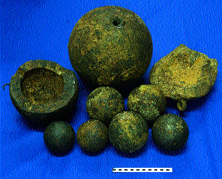 Iron and stone cannon balls and large mortar bombs.