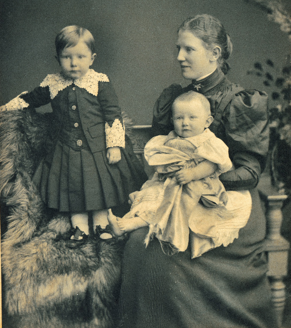 Baby Marie on her mother's knee with brother Tommy-the epitome of a late Victorian, upper middle-class family. (Martin family)