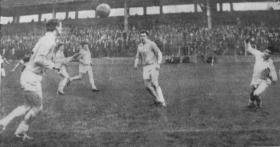 Dublin’s Eamonn Breslin nods the ball past Laois goalkeeper, Tom Miller, for the controversial headed goal in the 1964 National League game at Croke Park. (Irish Independent)