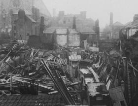Beresford Street, showing Simpson’s Court and the backs of the collapsed houses on Church Street. The rose window of the Catholic St Michin’s is visible at the top left corner. The Father Mathew Hall is to it right. (RSAI)