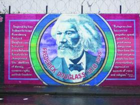 Mural (and message) of Frederick Douglass on Belfast’s Lower Falls Road—his The narrative of the life of Frederick Douglass was one of the first, and perhaps the most famous, memoirs of slavery. (Camel Productions)