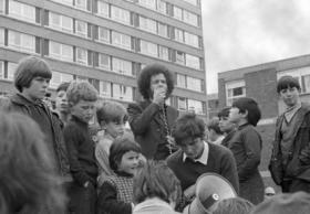 Eamonn McCann addressing a youthful audience outside Rossville flats, Derry—‘Our conscious, if unspoken, strategy was to provoke the police into overreaction and thus spark off mass reaction against the authorities’. (Eamon Melaugh)