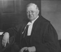 An official photo of Chief Justice Hugh Kennedy with, significantly, his wig in his hand and not on his head. Kennedy had been the Irish executive’s top legal expert even before the government was officially recognised by the British. He served as an adviser to the provisional government during negotiations over the Anglo-Irish Treaty, was its law officer and the Free State’s first attorney general. He would later be appointed the first chief justice of the Supreme Court, where he sat until his death in 1936. An ardent nationalist, his involvement in cultural organisations may explain his special interest in the costume debate. (UCD Archives)
