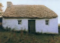 Biddy Early’s small, two-roomed cottage overlooking Kilbarron Lake in Feakle, Co. Clare, following renovation in the early 1970s. It fell back, however, into the state of ruin (inset) in which it lies today. (Tulla Library, Google Images)