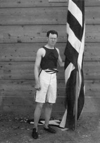 James Brendan Connolly beside an American flag at the 1896 Athens games. (IOC Lausanne)