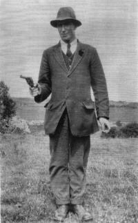 Séamus Hennessy, posing with a Webley revolver during the Civil War.
