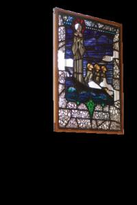 A Harry Clarke stained glass window depicting St Brendan—rescued from a skip by Peter Pearson, the architectural historian.