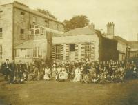 Parents and pupils at a St Enda’s open day at the Hermitage, Rathfarnham. Pearse is amongst the group of smaller boys sitting on the grass to the right. (Pearse Museum)
