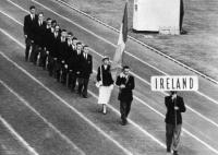 THEN—Maeve Kyle and the Irish team on parade at the 1956 Melbourne Olympics. Note the name ‘IRELAND’, the first time that designation was accepted by the IOC, courtesy of lobbying by Lord Killanin, recently elected president of the Olympic Council of Ireland. (Irish News Agency)