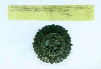 But is his cap badge the same one put up for auction at Mealy’s? The pencilled note of authentication signed by ‘Seán’ [Gen. Seán Mac Eoin] reads: ‘Cap badge removed from General Michael Collins vehicle at Cork Union Hospital August 23 1922’. (Emmet Dalton and Mealy Auctioneers)