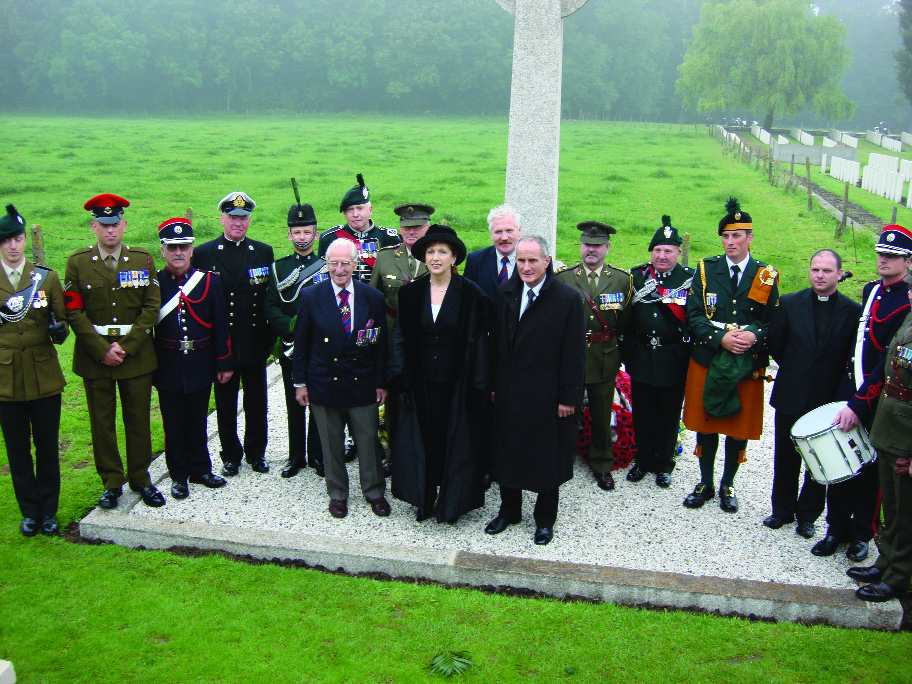 President Mary McAleese at the foot of the 16th (Irish) Division's cross in Wijtschate in June 2007.