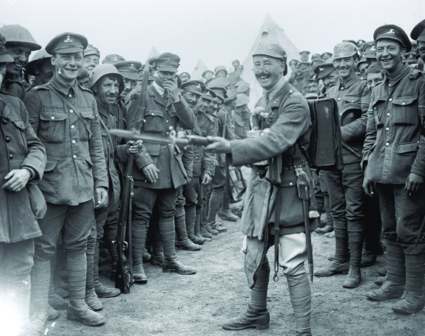 Royal Dublin Fusiliers celebrating their victory at Wijtschate, June 1917. (Imperial War Museum)