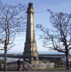 A monument on the Dún Laoghaire sea front which commemorates the ‘first stone of the eastern pier laid by his Excellency Earl Whitworth Lord Lieutenant of Ireland on 31 May 1817’, and the visit of King George IV in 1821. Departing from Ireland by the new venture, he designated it a ‘royal harbour’ and renamed Dunleary as ‘Kingstown’. Erected in 1823, the monument also records the names of the harbour commissioners and the principal engineering staff.