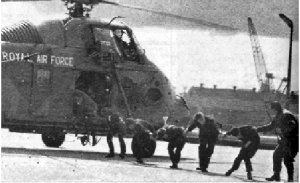  Internees disembarking from an RAF helicopter. Some internees were repeatedly thrown blindfolded from such helicopters hovering a few feet above the ground. (An Phoblacht) 