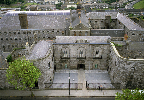 Above: Kilmainham Gaol and (inset) the chained hydra over the door. (National Monuments Service/DAHG)