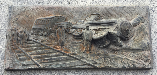 Above: One of the three plaques on the monument (designed by Robert Ballagh) commemorating the Colt Wood derailment. The others are a copy of the Proclamation and a dedication that names the Volunteers involved, including Paddy Ramsbottom.