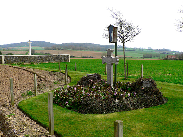 Above: The grave of Willie Redmond near Locre Hospice Cemetery—still separated from the rest of his comrades.